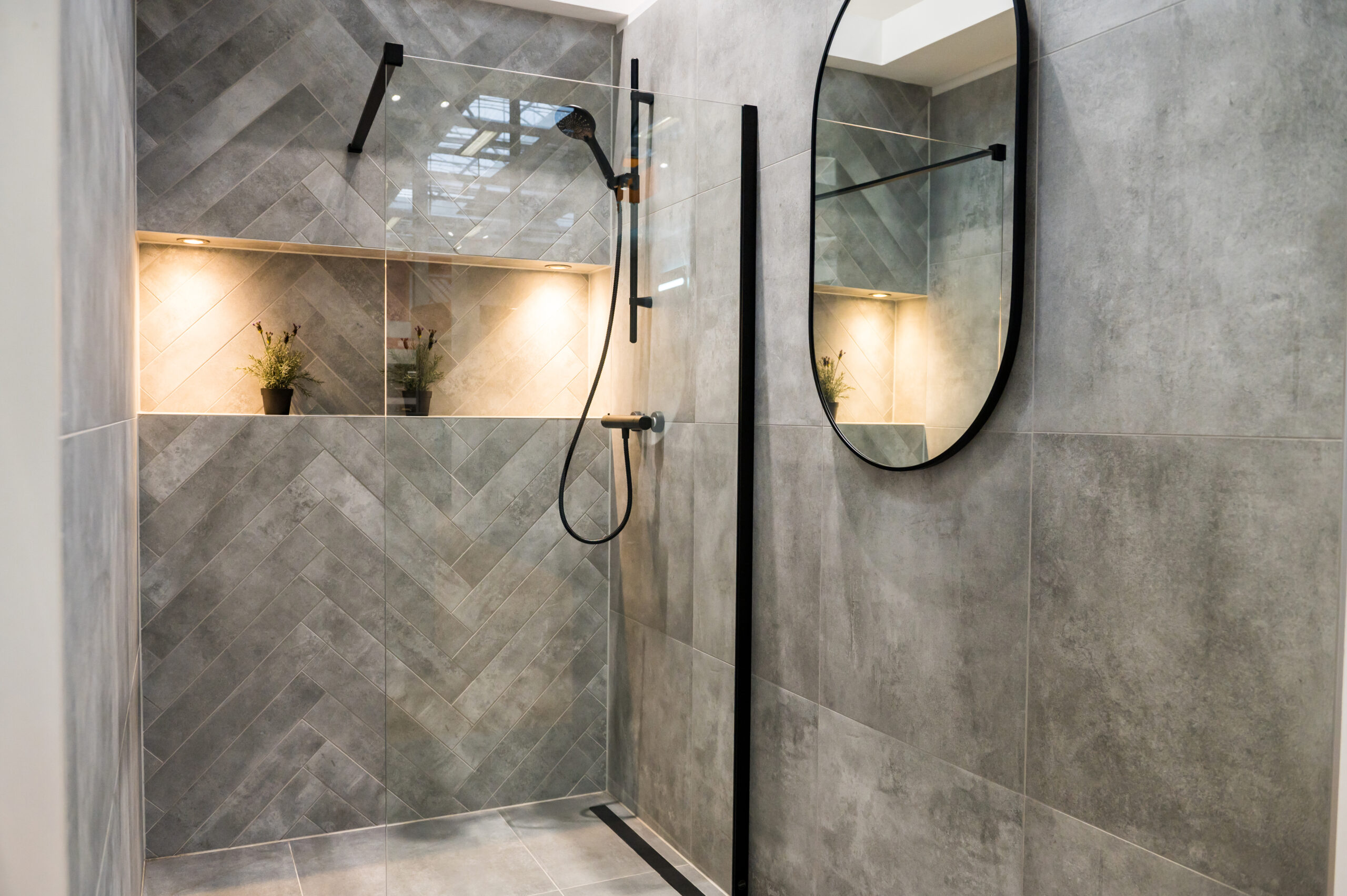 Sleek Bathroom with Herringbone Tile Design